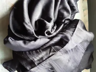 Tessuto marrone con disegni 150x150