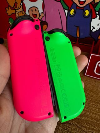 Joy-Con Nintendo Switch verdi e rosa ORIGINALI