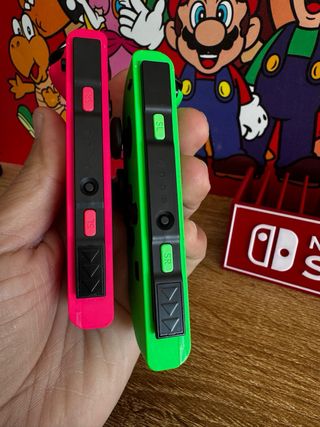 Joy-Con Nintendo Switch verdi e rosa ORIGINALI