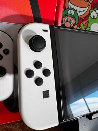 Nintendo Switch OLED come nuova con scatola e accessori