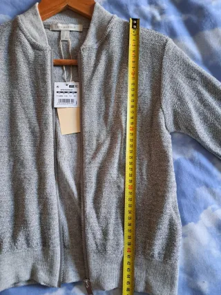 Chaqueta corta metalizada plateada Nueva