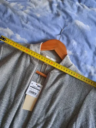 Chaqueta corta metalizada plateada Nueva