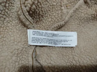 Chaquetón niña imitación piel vuelta