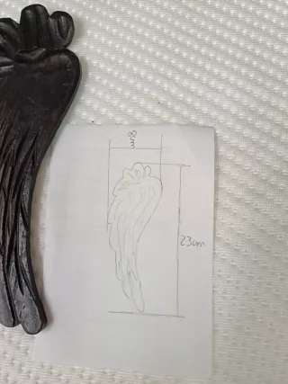 Alas talladas madera oscura