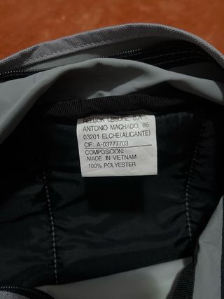 Mochila Reebok original gris – buen estado