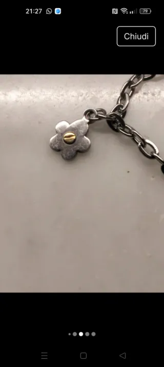 Braccialetto acciaio con ciondoli e inserti in oro