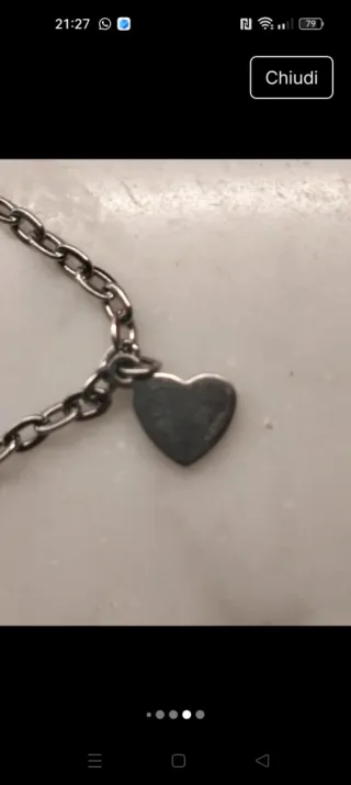 Braccialetto acciaio con ciondoli e inserti in oro