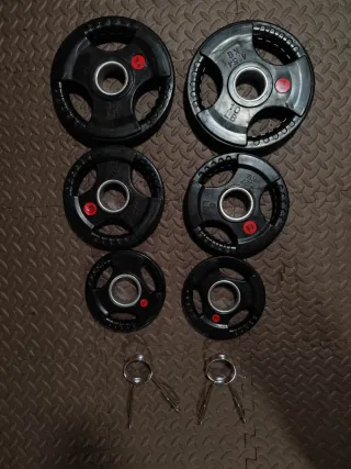 Set 6 dischi olimpici + ferma dischi