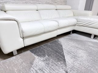 Divano angolare in pelle bianco