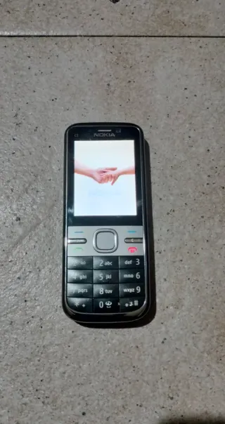 Móvil... Nokia C5...con cargador