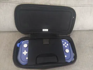 Nintendo Switch Lite Blu quasi nuova. Utilizzo molto limitato.