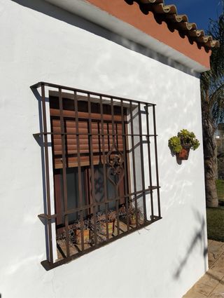 Ventana corredera aluminio con la reja