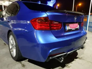 Escape bmw 440i con difusor de fibra carbón