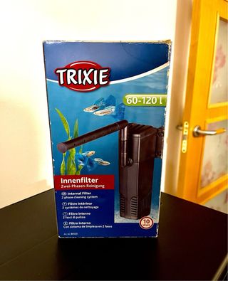 Pecera con filtro, mueble y vitaminas