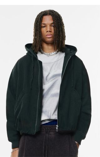 Chaqueta acolchada beige con capucha