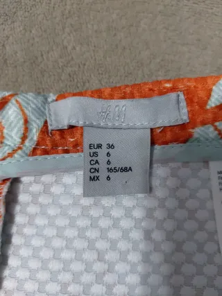 Falda estampada naranja y blanca