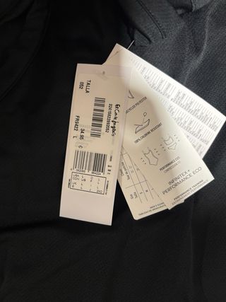 Camiseta tirantes Adidas negra y blanca