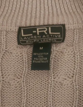 Jersey abierto R.L. color beige muy clarito.