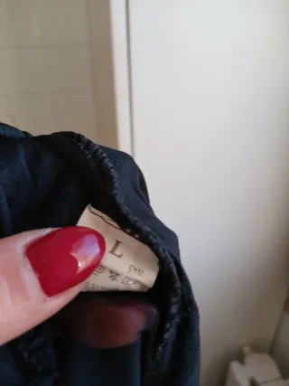 Top nero con paillettes