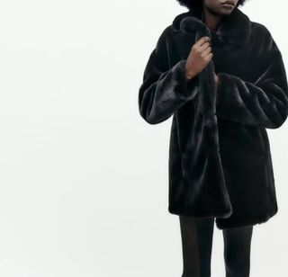 Abrigo pelo negro