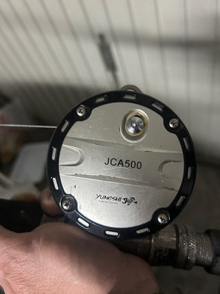 Caña y carrete de pesca para embarcación