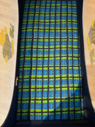 Cuna de viaje azul y verde