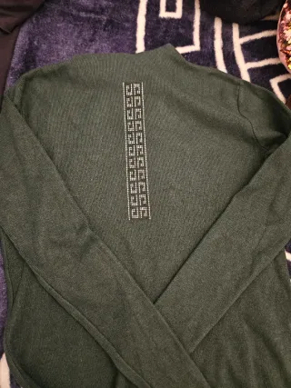 Jersey verde con detalle