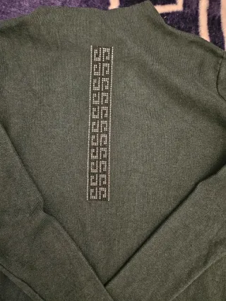 Jersey verde con detalle