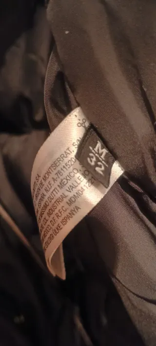 Abrigo plumífero negro mujer