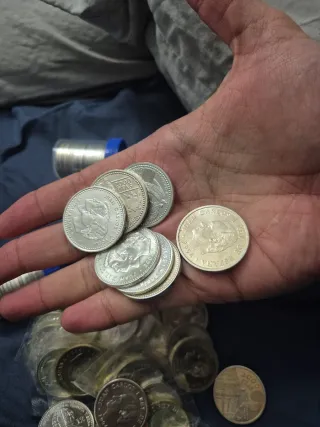 100 monedas de 2000 pesetas y 12 euros 18gplata925