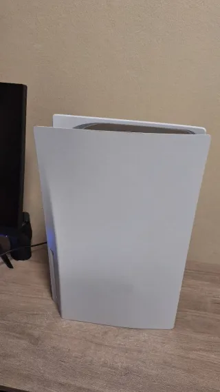 Play Station 5 con 2 mandos y un disco duro