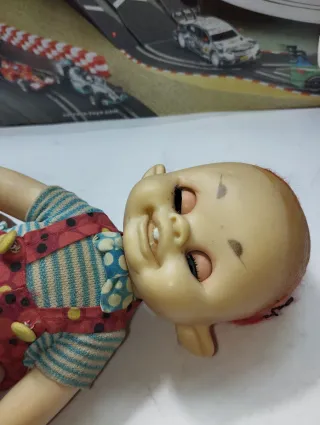 Muñeco bebé vintage ojos azules