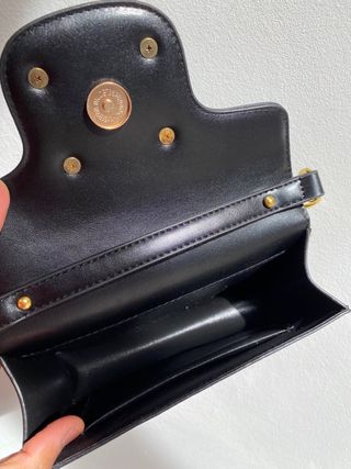 Bolso VLNTN Negro con Logo Dorado