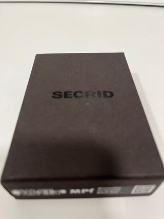 Cartera Secrid Negra con Puntos Rojos