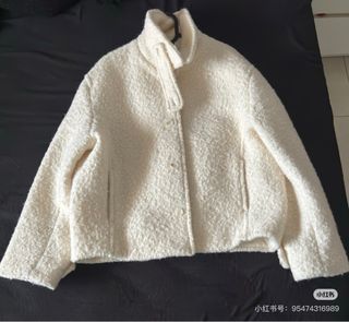 Chaqueta blanca texturizada