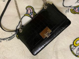 Bolso negro multiposición efecto piel