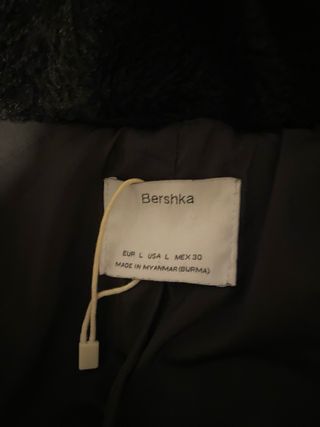 Chaqueta negra pelo con capucha