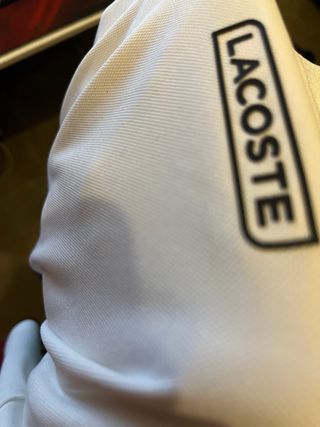Polo Lacoste blanco y verde