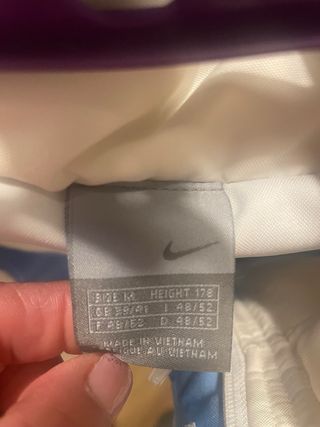 Chaqueta Nike Air acolchada beige y azul