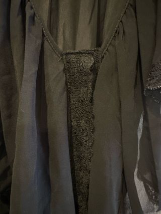 Blusa transparente con volantes