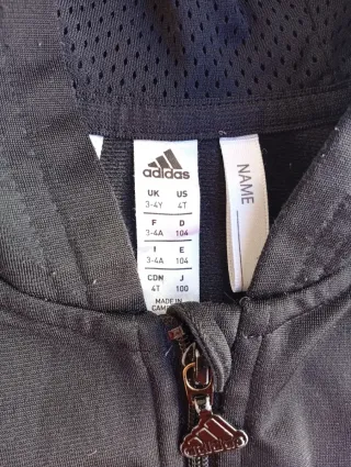 Chaqueta Adidas niño negra y dorada