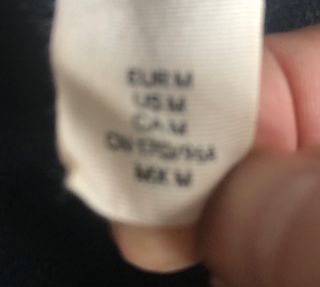 Abrigo largo morado mujer Cortefiel.