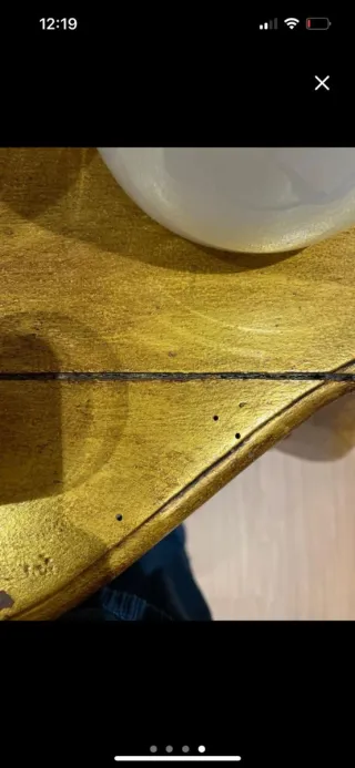 Mueble recibidor dorado diseño curvo