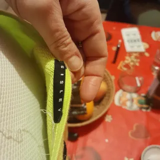 Maglia verde lime con righe nere