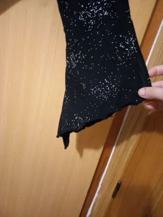 Blusa negra con pedrería