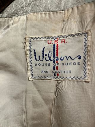 Abrigo de piel beige/gris con cuello de pelo real