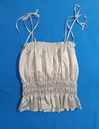 Top corto champagne con tirantes