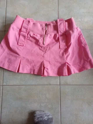 Gonna rosa corta con zip