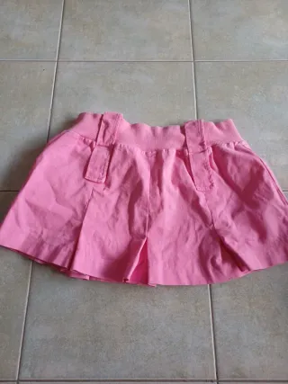 Gonna rosa corta con zip