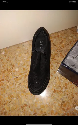 Stivaletti neri zeppa